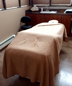 Massage table in a clean modern room 